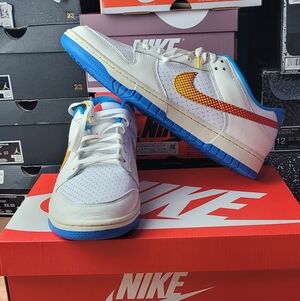 Nike White and Blue Sneakers with Orange Swoosh